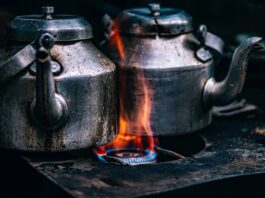 Shot of two tea pots on stove